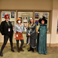 Staff dressed up at Library Comic Con