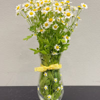A photo of flowers in a vase