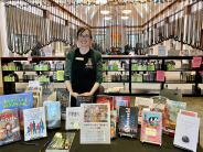 Organizer Sara next to raffle table