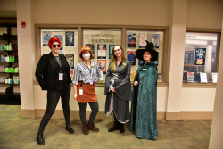Staff dressed up at Library Comic Con