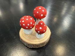 Miniature wooden mushrooms decorated with paint